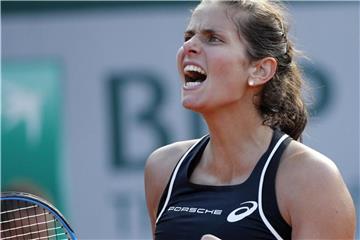 Julia Görges setzte sich in drei Sätzen durch. Foto: Christophe Ena/AP