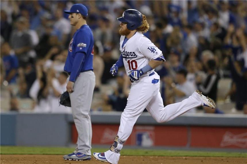 MLB: Los Angeles gewinnt erstes Spiel gegen Houston Justin Turner (r) sorgte mit seinem Homerun im sechsten Inning für die Entscheidung zu Gunsten der Los Angeles Dodgers. Foto (Archiv): Paul Buck Foto: Paul Buck
