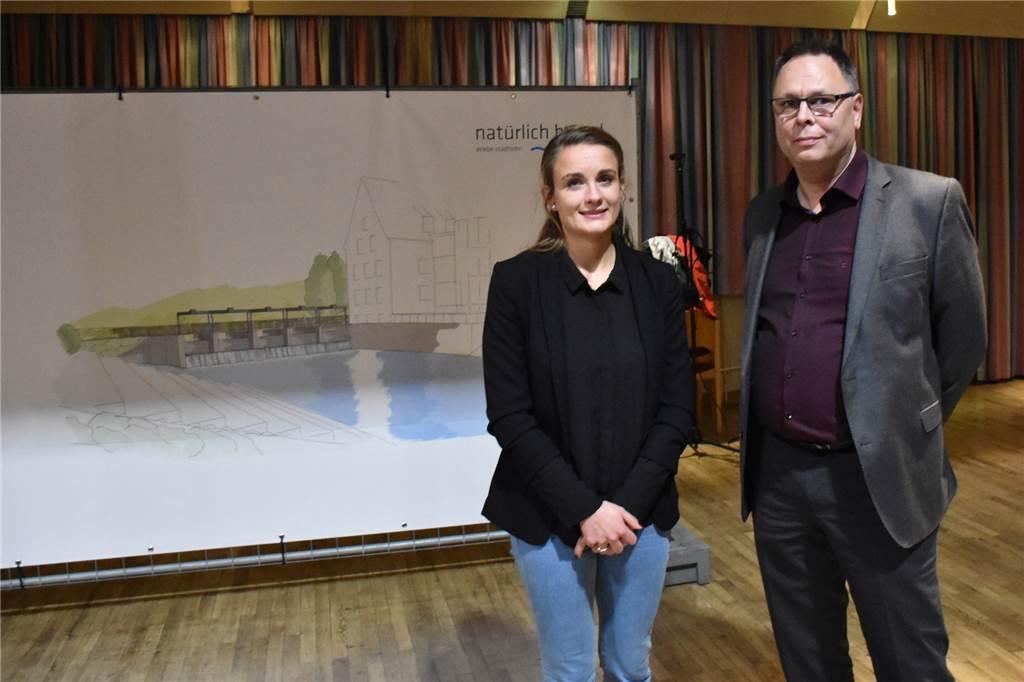 Der Weg zur neuen Berkelpromenade führt über Lärm, Staub und Sperrungen Laura Banning und Reiner Segschneider vom Ingenieurbüro Björnsen in Dortmund betreuen die Baustelle vor Ort, hinter ihnen eine Ansicht des künftiges Berkelwehrs.