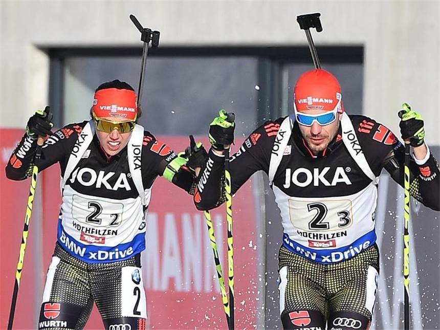 Deutsche Mixed-Staffel gewinnt Gold bei Biathlon-WM Laura Dahlmeier und Arnd Peiffer beim Wechsel. Foto: Martin Schutt
