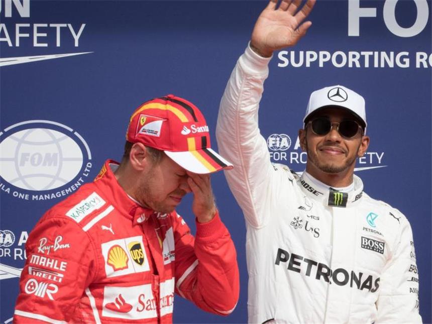 Darauf muss man achten beim Großen Preis von Belgien Lewis Hamilton (r) und Sebastian Vettel bilden die erste Startreihe beim Großen Preis von Belgien. Foto: Benoit Doppagne