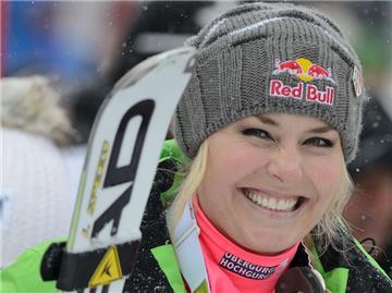 Lindsey Vonn feierte nach dem Super-G das Speed-Triple von Lake Louise. Foto: Mike Sturk