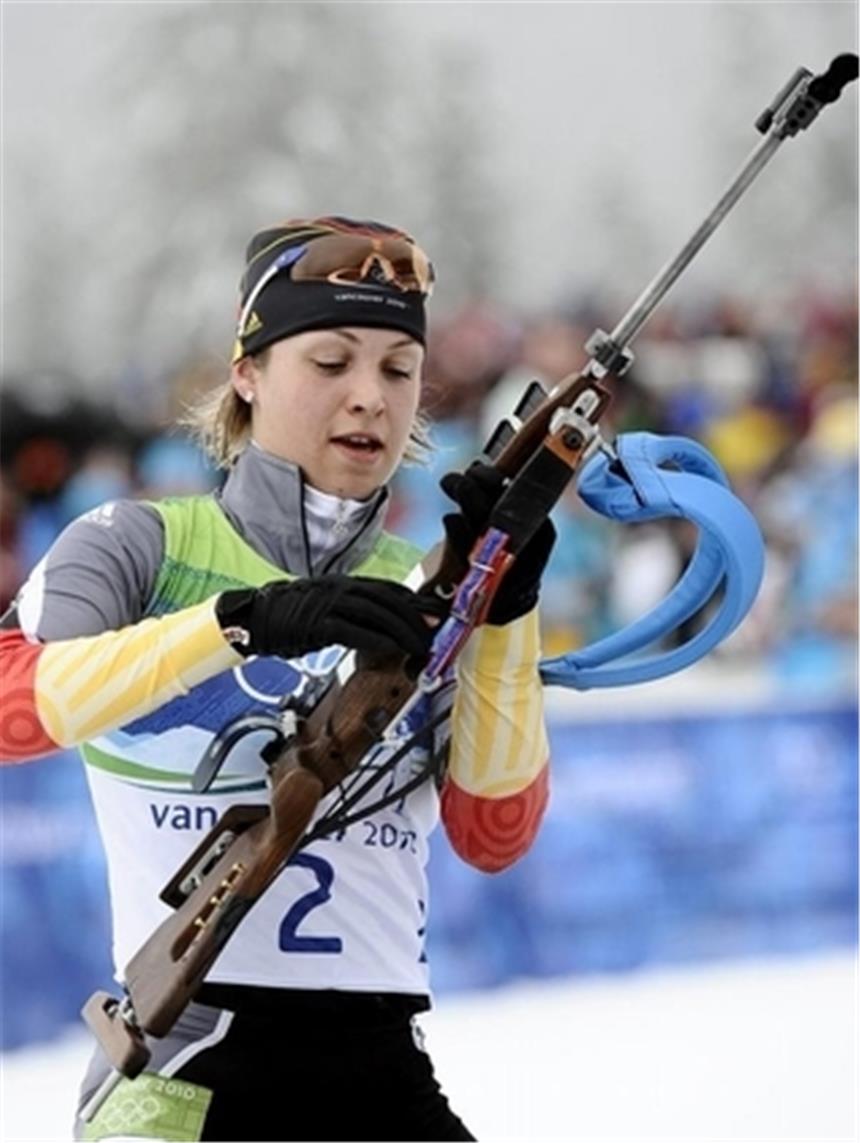 Goldener Olympia-Tag dank Hüfner und Neuner Magdalena Neuner bereitet eine Schießeinlage vor.