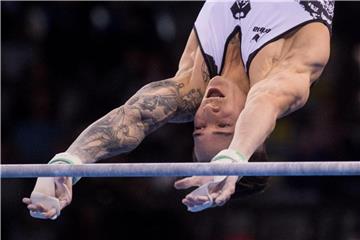Marcel Nguyen bei seiner Übung am Reck. Foto: Marijan Murat