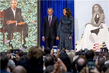 Michelle und Barack Obama in Öl. Foto: Andrew Harnik/AP