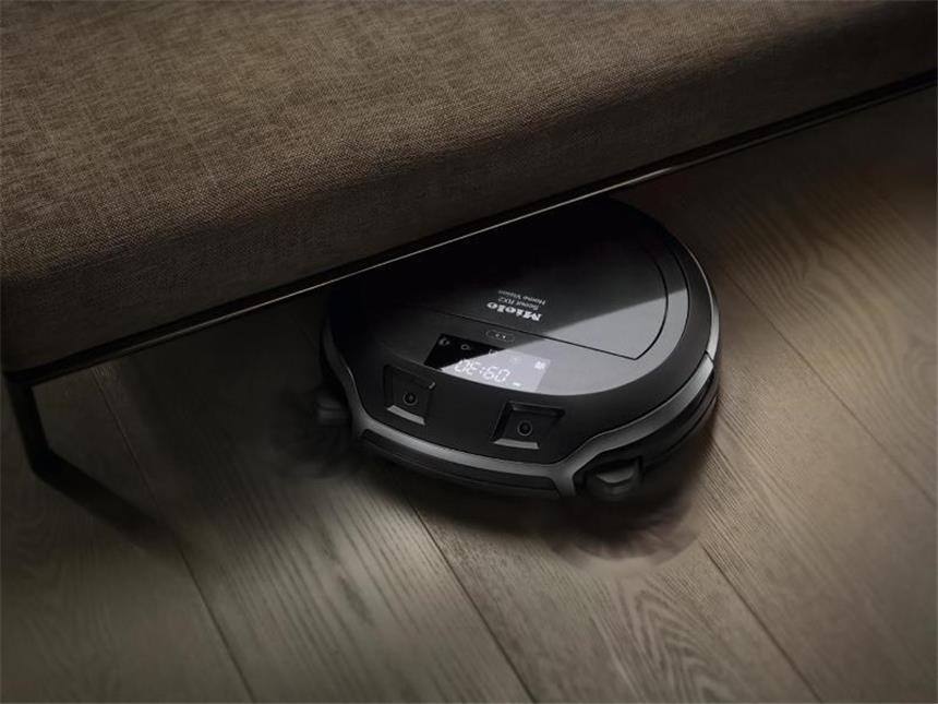 Miele schafft mit seinem neuen Modell Scout RX2 eine dreifach höhere Staubaufnahme von Teppichböden im Vergleich zu Vorgängermodellen der Firma. Foto: Miele/dpa-tmn