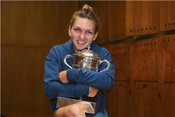 Mit dem Sieg bei den French Open wird Simona Halep zu einer rumänischen Sportlegende. Foto: Corinne Dubreuil/FFT/AP