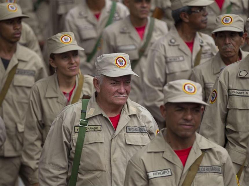 Lage in Venezuela eskaliert: Drei Tote Mitglieder der bolivarianischen Miliz in Caracas. Foto: Ariana Cubillos