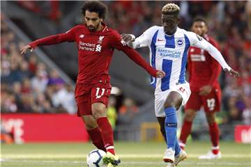 Mohamed Salah (l) schoss das entscheidende 1:0 gegen Brighton. Foto: Martin Rickett/PA