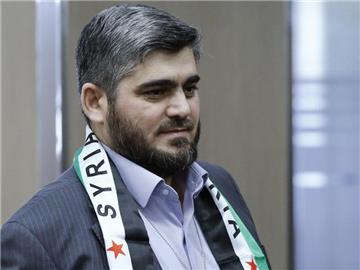 Mohammed Allusch, Führungsmitglied der Rebellengruppe Dschaisch al-Islam, begründet seinen Rücktritt mit der Kompromisslosigkeit des syrischen Regimes und den fortgesetzten Angriffen gegen Zivilisten. Foto: Denis Balibouse