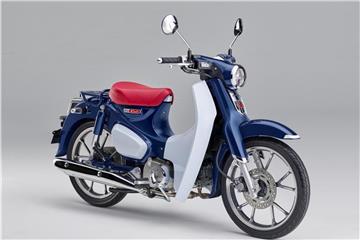 Motorradklassiker: Die ersten Modelle der Super Cub gehen zurück auf das Jahr 1958 - die aktuelle Version Super Cub C125 soll im Oktober auch nach Deutschland kommen. Foto: Honda