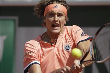 Musste auch im Achtelfinale erneut über fünf Sätze gehen: Alexander Zverev. Foto: Alessandra Tarantino/AP