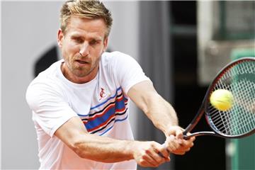 Musste in Paris in der ersten Runde aufgeben: Peter Gojowczyk. Foto: Salvatore Di Nolfi