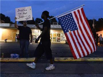 Nach dem Tod von Michael Brown kommt die Stadt Ferguson nicht zur Ruhe. Foto: Larry W. Smith
