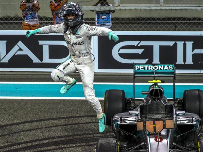 Rosberg feiert WM-Triumph im Zitter-Finale Nach der Zieldurchfahrt brennt der neue Weltmeister erst seine Freude in den Asphalt. Foto: Srdjan Suki