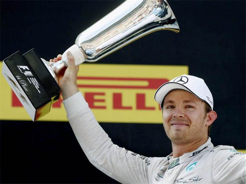 Rosberg jubelt in Barcelona - Hamilton vor Vettel Nach seiner ersten Pole in diesem Jahr reicht es für den Wiesbadener auch zum Titel. Foto: Andreu Dalmau