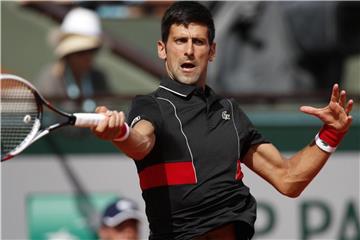 Novak Djokovic hat zum zwölften Mal das Viertelfinale der French Open erreicht. Foto: Christophe Ena/AP