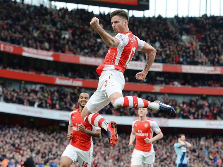 Chelsea und ManCity patzen - Arsenal Team der Stunde Olivier Giroud feiert seinen Treffer für Arsenal mit einem Riesensatz. Foto: Andy Rain