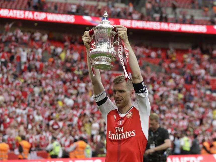 Khedira, Kroos oder Arsenal-Trio - Legionäre feiern Titel Per Mertesacker gewann mit dem FC Arsenal den FA-Cup. Foto: Matt Dunham