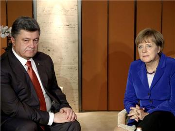 Poroschenko und Merkel sprachen auch über die Lage in der Konfliktregion Ostukraine. Foto: Mykhailo Palinchak/TASS/Archiv