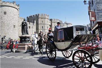 Probelauf für die Kutschfahrt - ohne Harry und Meghan. Foto: Frank Augstein/AP