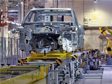 Produktion bei Porsche: Eine geleistete Arbeitsstunde kostete in der deutschen Privatwirtschaft durchschnittlich 31,00 Euro, Jan Woitas Foto: Jan Woitas