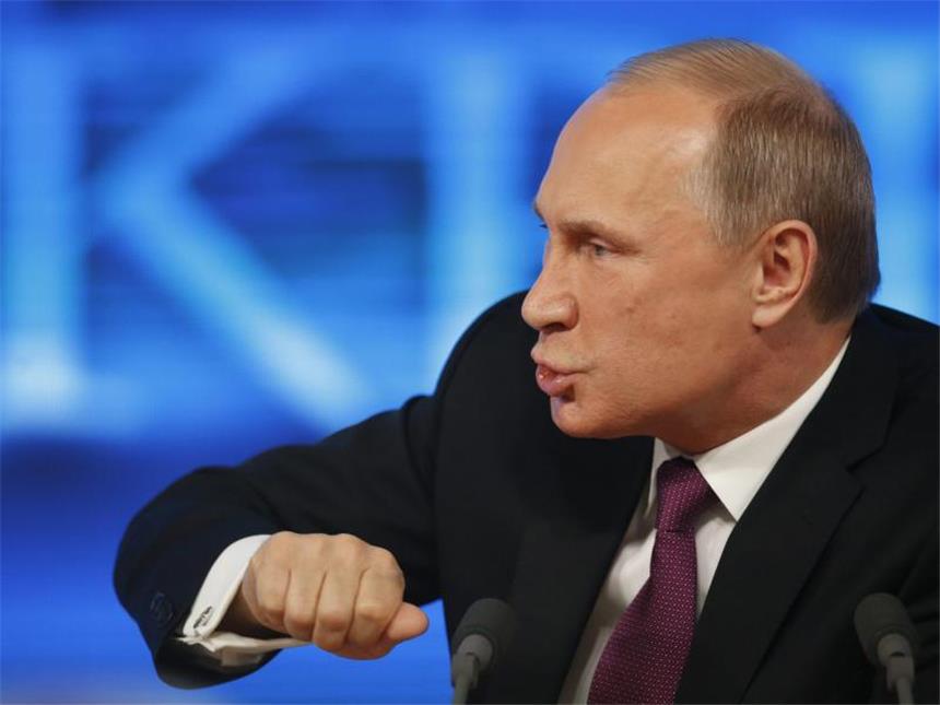 Putin verteidigt Ukraine-Politik vor der Weltpresse Putin: «Wir schützen unser Recht auf Existenz». Foto: Sergei Chirikov