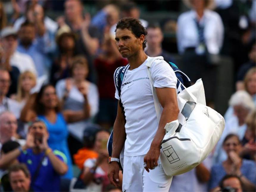 Nadal in Wimbledon überraschend ausgeschieden Rafael Nadal verlor gegen den Luxemburger Gilles Muller. Foto: Alastair Grant