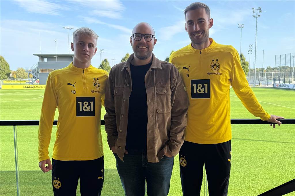 Danylo Krevsun, Cedric Gebhardt und Michael Eberwein posieren für ein Bild.