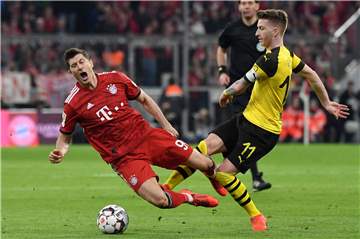 Robert Lewandowski (l.) und Marco Reus treffen am Samstagabend in der Münchener Allianz-Arena aufeinander.
