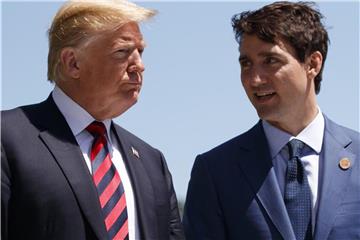 Schwierige Nachbarschaft: US-Präsident Donald Trump und der kanadische Premierminister Justin Trudeau während des letztlich gescheiterten G7-Gipfels. Foto: Evan Vucci/AP