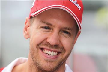 Sebastian Vettel freut sich auf seinen neuen Ferrari. Foto: Dario Oliveira/ZUMA Wire