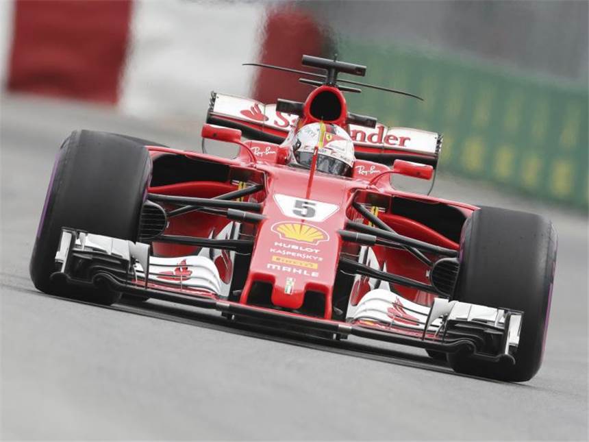 Spitzenreiter Vettel gegen Kanada-Experte Hamilton Sebastian Vettel hat gute Aussichten mit seinem Ferrari die Pole Position in Montreal zu holen. Foto: Tim Boland/The Canadian Press/AP