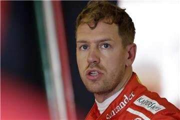Sebastian Vettel hofft noch einmal auf perfekte Arbeit seiner Ferrari-Mechaniker. Foto: Luca Bruno