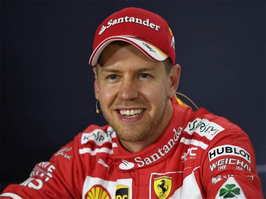 "Schwung und Kraft": Vettel jagt Hamilton in Australien Sebastian Vettel ist zufrieden mit seinem neuen Ferrari. Foto: Andy Brownbill