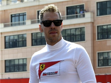 Sebastian Vettel will mit Ferrari das Momentum aufrechthalten und macht sich keine Gedanken über einen neuen Vertrag. Foto: Claude Paris