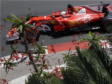 Sebastian Vettel will sich in Monaco die Pole Position holen. Foto: Claude Paris