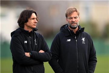 Seit vielen Jahren ein Erfolgs-Duo: Liverpool-Coach Jürgen Klopp und Co-Trainer Zeljko Buvac. Foto: Peter Byrne