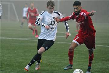 Serhat Delen (r.) erzielte den Ehrentreffer für die DJK Stadtlohn beim Duell in Holtwick.