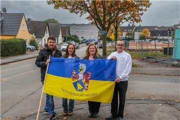 Sie leben gern in Lütgendortmund: v.l. Michael Schneider, Melanie May, Anja Benninghoff und Heinz Günter Rose von der Siedlergemeinschaft Idastraße.