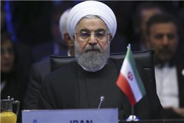 Sieht sich mit Protesten der Bevölkerung konfrontiert: Der iranische Präsident Hassan Ruhani. Foto: Erhan Elaldi