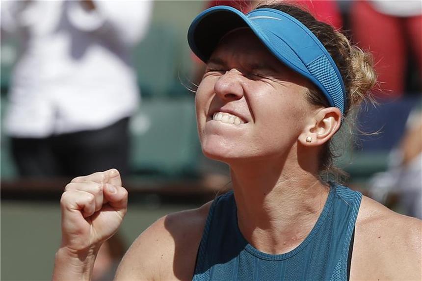 Erster großer Titel: Halep legt Verlierer-Image ab Simona Halep hat ihren ersten Grand-Slam-Titel geholt. Foto: Michel Euler