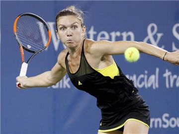 Simona Halep unterlag im Finale von Cincinnati klar mit 1:6, 0:6 gegen Garbiñe Muguruza. Foto: John Minchillo