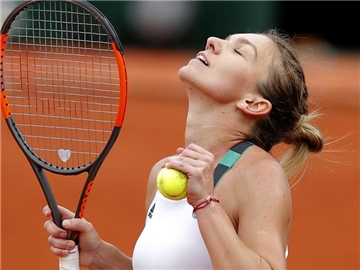 Simona Halep will sich bei den French Open den Titel holen. Foto: Michel Euler