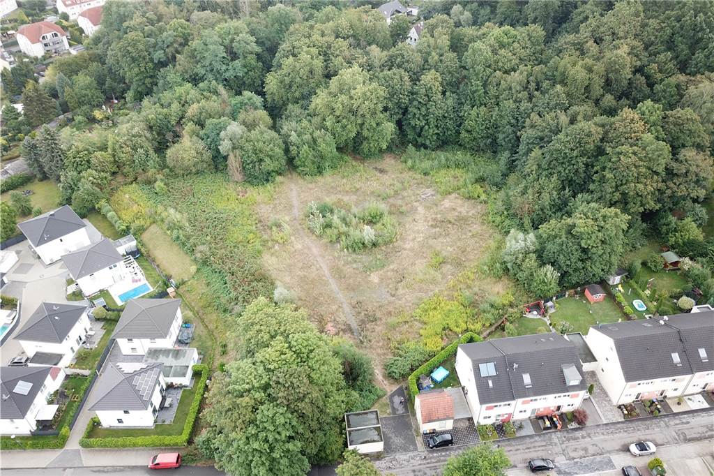Klimaneutrales Quartier auf altem Zechengelände: So sehen die Neubau-Pläne im Detail aus So sieht das Gelände derzeit aus der Luft aus. Unten ist die Schieferbergstraße zu sehen, links das kleine Stadtvillen-Quartier.