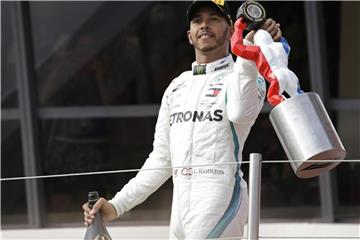 Steht bei Mercedes kurz vor der Vertragsverlängerung: Weltmeister Lewis Hamilton. Foto: Claude Paris/AP