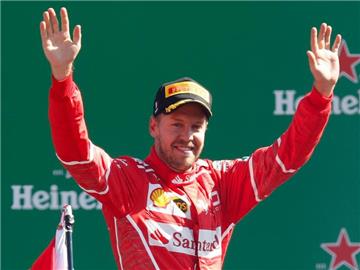 Steht beim Großen Preis von Singapur und Erfolgszwang: Sebastian Vettel. Foto: Luca Bruno