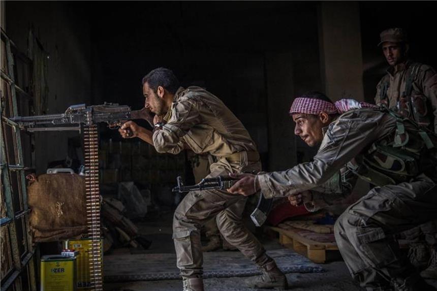 Protest gegen Vorsitz Syriens in Genfer Abrüstungskonferenz Syrische Truppen im Einsatz bei Al-Rakka: Das Bürgerkriegsland leitet jetzt die Genfer Abrüstungskonferenz. Foto: Morukc Umnaber