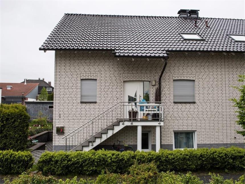 Familiendrama: Kinder mit Injektionen getötet? Tatort des schrecklichen Familiendramas. In diesem Haus soll eine 44-jährige Mutter ihre zwei Töchter und dann sich selbst getötet haben. Foto: Bernd Thissen