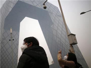Touristen sollten bei starkem Smog Atemschutzmasken tragen. Foto: How Hwee Young